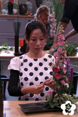 Floristry student with their linear design