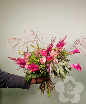 Student with their asymmetric bouquet
